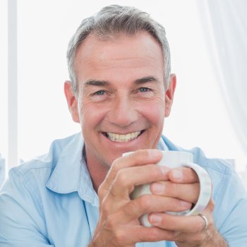 Smiling middle aged men Dental Care   Acworth patient group