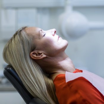 Woman relaxing on dentist chair Dental Care   Acworth care